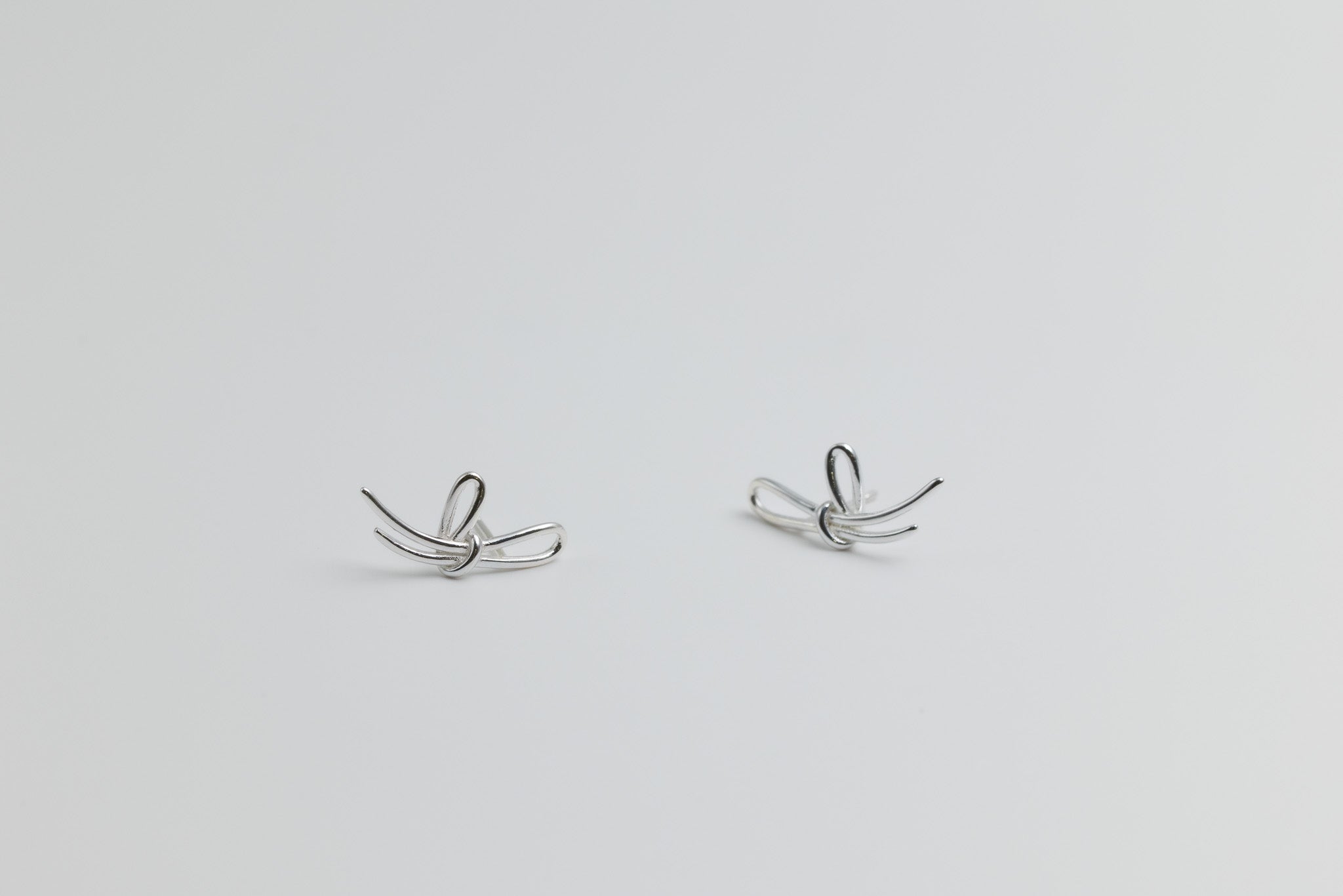 Dancing Bow Earrings Silver
